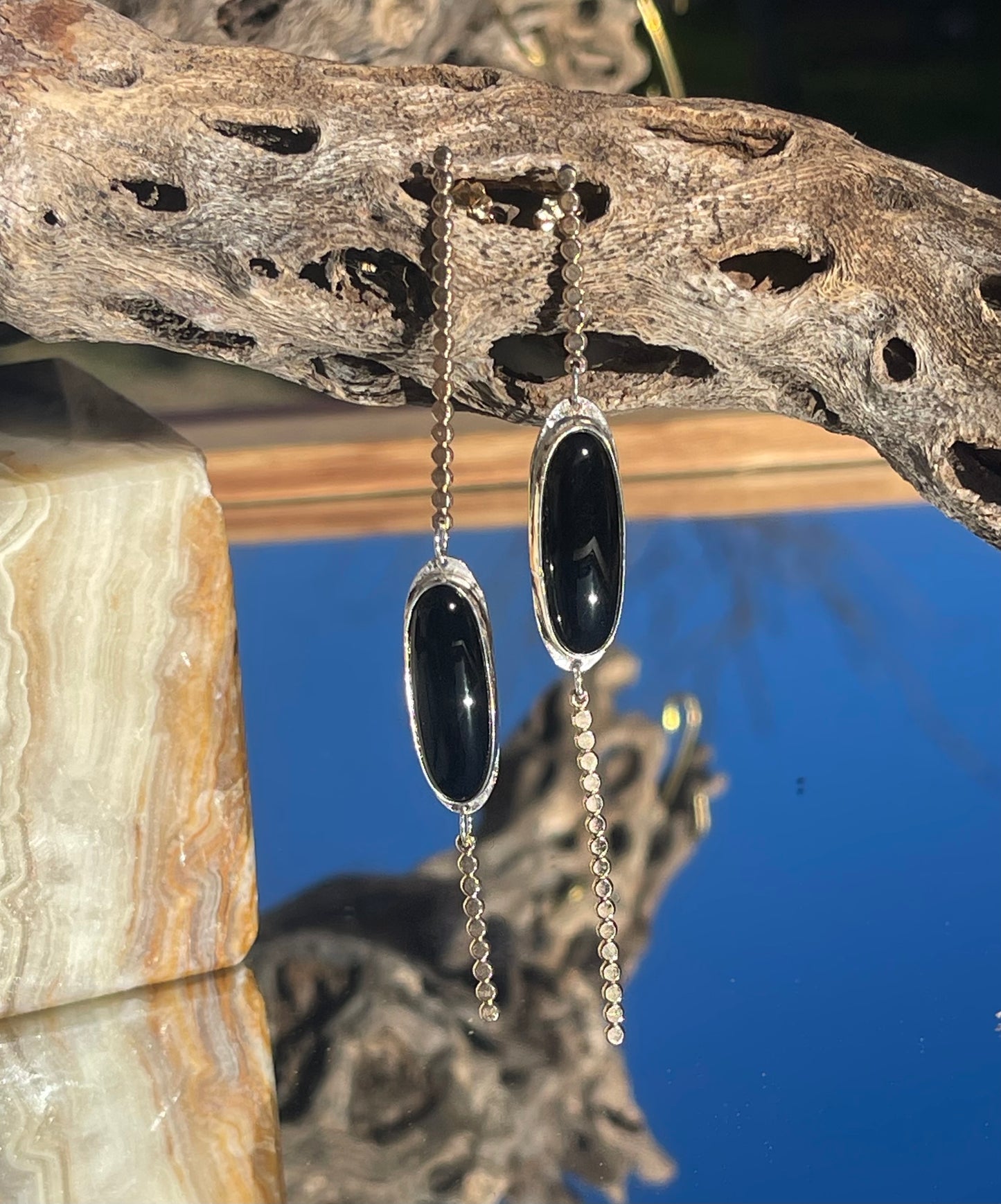 Contradicting Black Onyx Danglers
